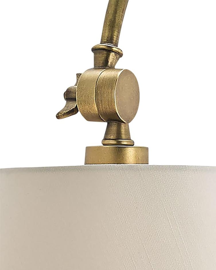 Ashby Swing-Arm Sconce In Antique Brass by Currey & Company