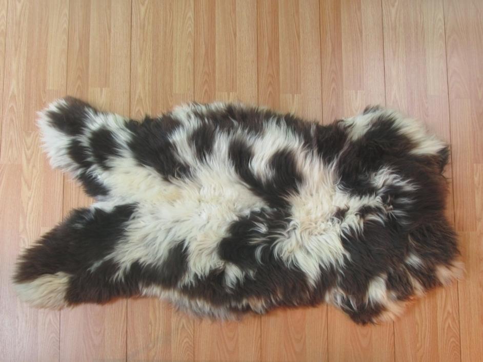 Shaggy White and Brown Spotted Sheepskin by Aster International