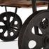 Industrial Loft 64-Inch Reclaimed Teak Coffee Table with Antique Zinc Wheels by Home Trends & Design