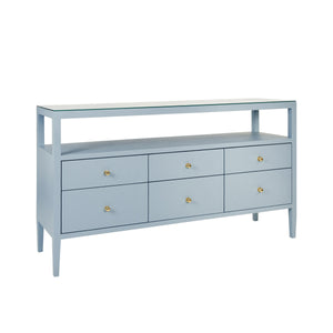 SIX DRAWER CONSOLE WITH OPEN SHELF IN TEXTURED LIGHT BLUE LINEN WITH POLISHED BRASS KNOBS