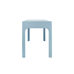 CURVED FRONT DESK WITH THREE DRAWERS IN LIGHT BLUE TEXTURED LINEN WITH SATIN BRASS RING HARDWARE AND GLASS TOP