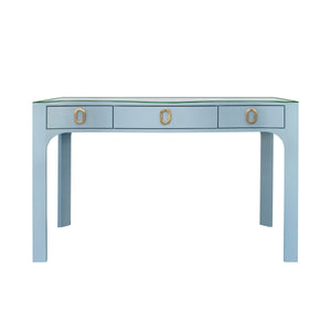 CURVED FRONT DESK WITH THREE DRAWERS IN LIGHT BLUE TEXTURED LINEN WITH SATIN BRASS RING HARDWARE AND GLASS TOP