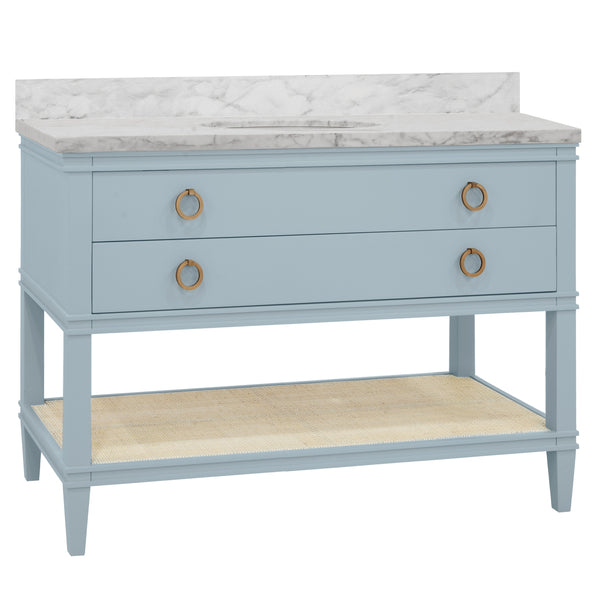 BATH VANITY IN MATTE LIGHT BLUE LACQUER WITH OPEN CANE SHELF, WHITE MARBLE TOP, PORCELAIN SINK, AND ANTIQUE BRASS RING HARDWARE, 48" WIDE