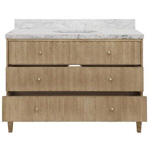 BATH VANITY WITH VERTICAL FLUTED DETAIL ON DRAWERS IN CERUSED OAK WITH WHITE MARBLE TOP, PORCELAIN SINK, AND POLISHED BRASS KNOBS, 48" WIDE