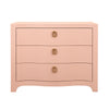 CURVED FRONT CHEST WITH THREE DRAWERS IN TEXTURED PINK LINEN WITH SATIN BRASS RING HARDWARE