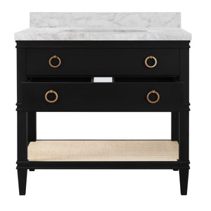 BATH VANITY IN MATTE BLACK LACQUER WITH OPEN CANE SHELF, WHITE MARBLE TOP, PORCELAIN SINK, AND ANTIQUE BRASS RING HARDWARE