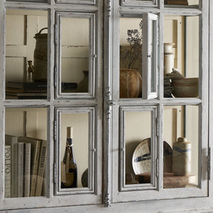 The "You Will Need A Lot Of Hinges" Cabinet