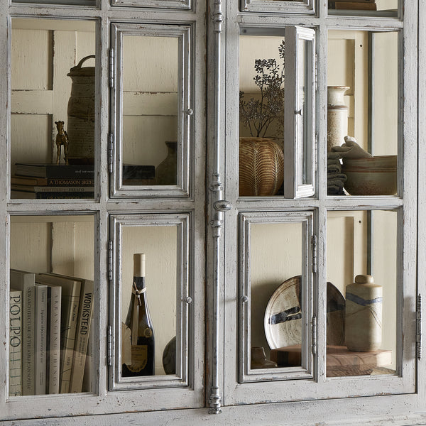 The "You Will Need A Lot Of Hinges" Cabinet
