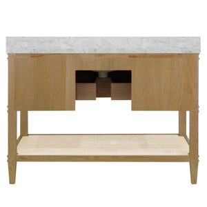 BATH VANITY IN CERUSED OAK WITH OPEN CANE SHELF, WHITE MARBLE TOP, PORCELAIN SINK, AND ANTIQUE BRASS RING HARDWARE, 48" WIDE