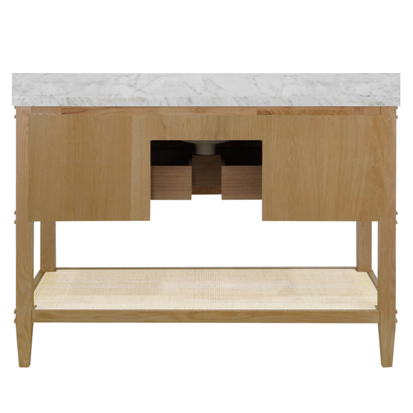 BATH VANITY IN CERUSED OAK WITH OPEN CANE SHELF, WHITE MARBLE TOP, PORCELAIN SINK, AND ANTIQUE BRASS RING HARDWARE, 48" WIDE