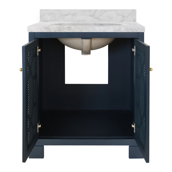 BATH VANITY IN MATTE NAVY LACQUER WITH CANE FRONT DOORS, WHITE MARBLE TOP, PORCELAIN SINK, AND POLISHED BRASS KNOBS