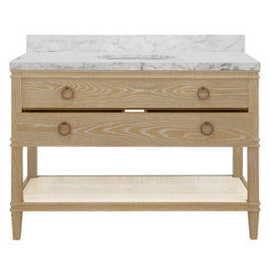 BATH VANITY IN CERUSED OAK WITH OPEN CANE SHELF, WHITE MARBLE TOP, PORCELAIN SINK, AND ANTIQUE BRASS RING HARDWARE, 48" WIDE