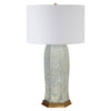CERAMIC TABLE LAMP WITH SATIN BRASS BASE IN OCEAN REACTIVE GLAZE.