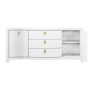 CURVED FRONT TWO DOOR THREE DRAWER BUFFET IN TEXTURED WHITE LINEN WITH SATIN BRASS RING HARDWARE