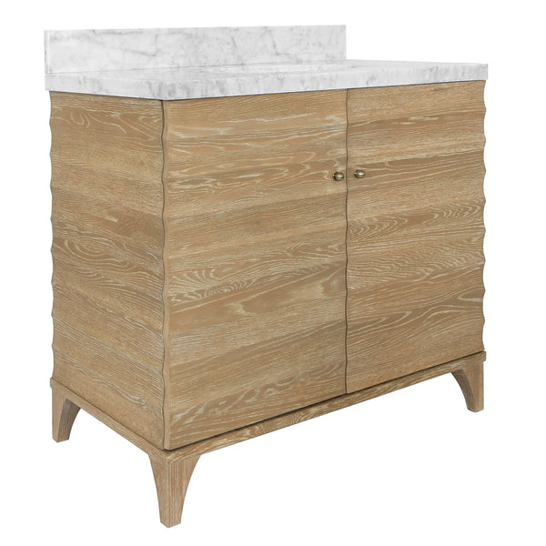 BATH VANITY WITH HORIZONTAL FLUTED DETAIL IN CERUSED OAK WITH WHITE MARBLE TOP, PORCELAIN SINK, AND POLISHED BRASS KNOBS