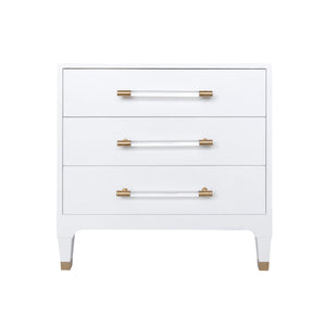 THREE DRAWER SIDE TABLE IN TEXTURED WHITE LINEN WITH ANTIQUE BRASS AND ACRYLIC HARDWARE