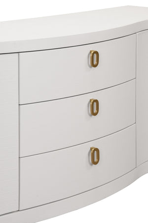 CURVED FRONT TWO DOOR THREE DRAWER BUFFET IN TEXTURED WHITE LINEN WITH SATIN BRASS RING HARDWARE