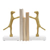 PAIR OF DOG BOOKENDS IN BRASS FINISH ON WHITE MARBLE BASE