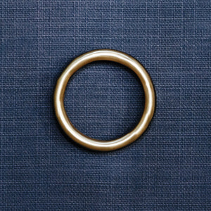 FOUR DOOR BUFFET WITH ANTIQUE BRASS CIRCLE HARDWARE IN TEXTURED NAVY LINEN