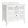 BATH VANITY IN MATTE WHITE LACQUER WITH CANE FRONT DRAWERS, WHITE MARBLE TOP, AND PORCELAIN SINK