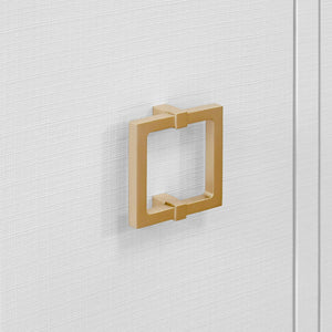FOUR DOOR BUFFET WITH LARGE BRASS SQUARE HARDWARE IN WHITE TEXTURED LINEN