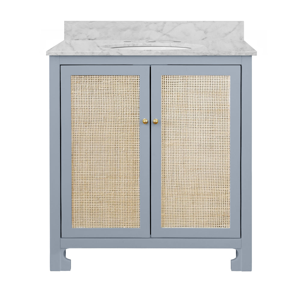 BATH VANITY IN MATTE LIGHT BLUE LACQUER WITH CANE FRONT DOORS, WHITE MARBLE TOP, PORCELAIN SINK, AND POLISHED BRASS KNOBS