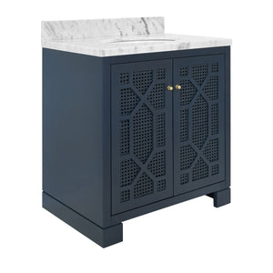 BATH VANITY IN MATTE NAVY LACQUER WITH CANE FRONT DOORS, WHITE MARBLE TOP, PORCELAIN SINK, AND POLISHED BRASS KNOBS