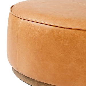 Sinclair Large Round Ottoman In Bttrscotch