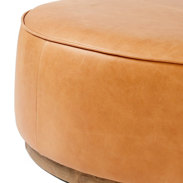 Sinclair Large Round Ottoman In Bttrscotch