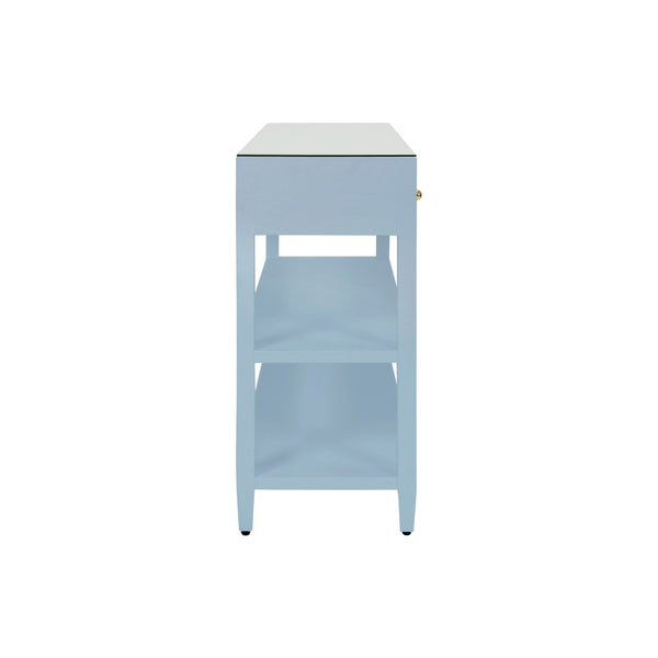 THREE DRAWER CONSOLE WITH TWO OPEN SHELVES IN TEXTURED LIGHT BLUE LINEN WITH POLISHED BRASS KNOBS