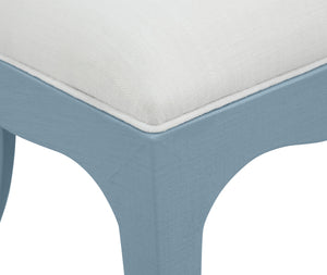 CURVED DINING CHAIR WITH SATIN BRASS RING HARDWARE ON BACK IN PERFORMANCE WHITE LINEN UPHOLSTERY AND TEXTURED LIGHT BLUE LINEN FRAME