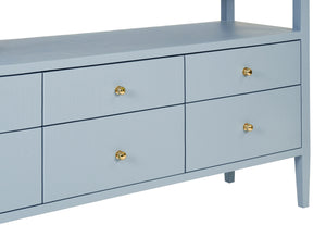 SIX DRAWER CONSOLE WITH OPEN SHELF IN TEXTURED LIGHT BLUE LINEN WITH POLISHED BRASS KNOBS