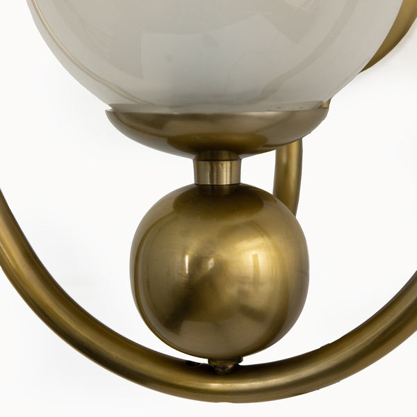 Elliot Sconce In Patina Brass And Frosted Glass And Clear Cord