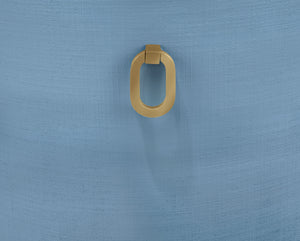CURVED DINING CHAIR WITH SATIN BRASS RING HARDWARE ON BACK IN PERFORMANCE WHITE LINEN UPHOLSTERY AND TEXTURED LIGHT BLUE LINEN FRAME