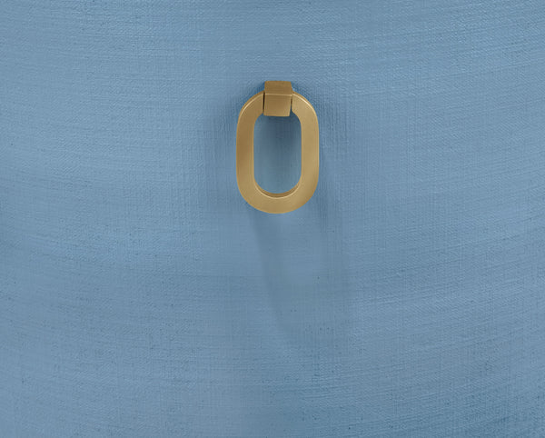 CURVED DINING CHAIR WITH SATIN BRASS RING HARDWARE ON BACK IN PERFORMANCE WHITE LINEN UPHOLSTERY AND TEXTURED LIGHT BLUE LINEN FRAME