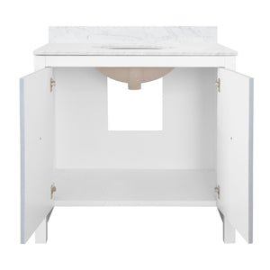BATH VANITY WITH TEXTURED LIGHT BLUE LINEN DOORS, MATTE WHITE LACQUER SURROUND, ANT BRASS HARDWARE, WHITE MARBLE TOP, AND PORCELAIN SINK