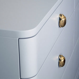 SIX DRAWER ROUNDED EDGE CHEST WITH BRASS BEETLE KNOB IN LIGHT BLUE MATTE LACQUER
