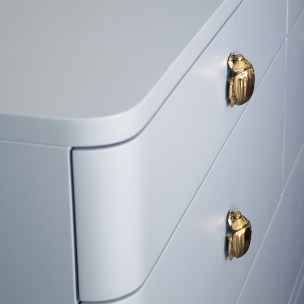 SIX DRAWER ROUNDED EDGE CHEST WITH BRASS BEETLE KNOB IN LIGHT BLUE MATTE LACQUER