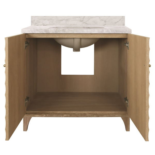BATH VANITY WITH HORIZONTAL FLUTED DETAIL IN CERUSED OAK WITH WHITE MARBLE TOP, PORCELAIN SINK, AND POLISHED BRASS KNOBS