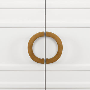 BATH VANITY IN MATTE WHITE LACQUER WITH ANTIQUE BRASS CIRCLE HARDWARE, WHITE MARBLE TOP, AND PORCELAIN SINK
