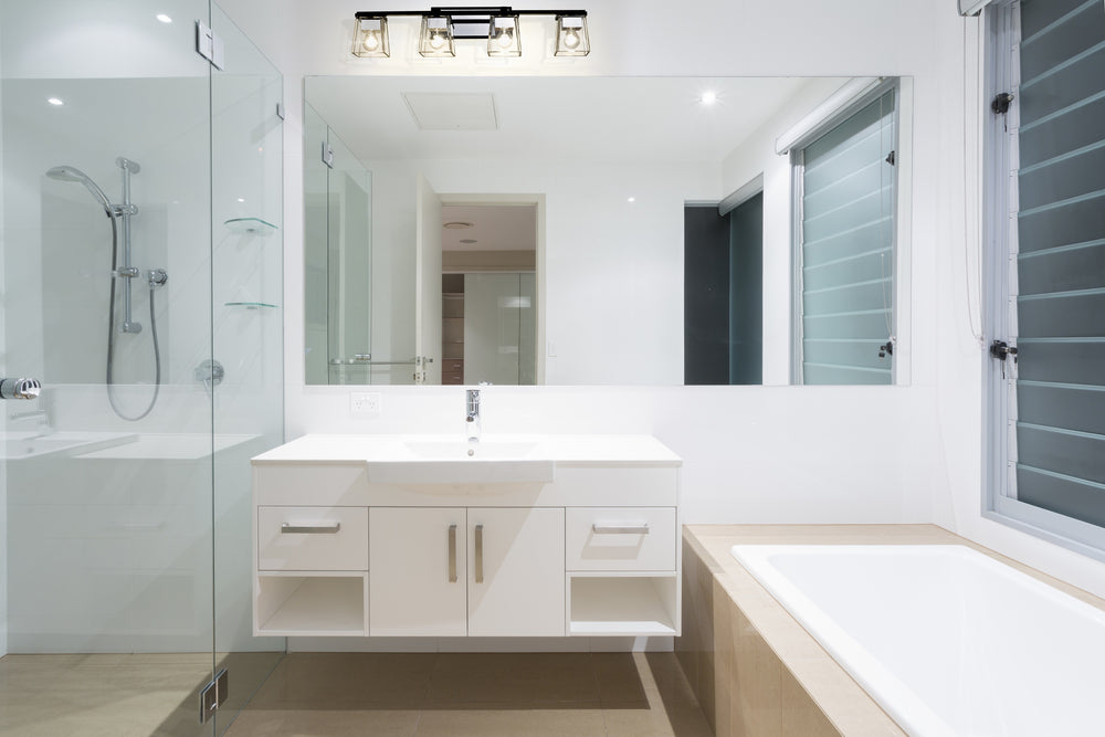 Bleeker Street 4 Light Vanity in Matte Black + Chrome Finish