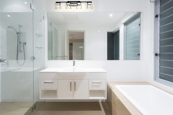 Bleeker Street 4 Light Vanity in Matte Black + Chrome Finish