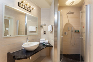 Parsons 4 Light Vanity in Matte Black + Brushed Nickel Finish