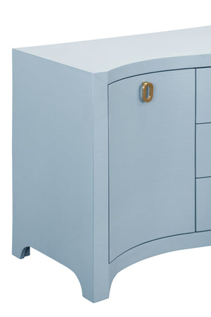 CURVED FRONT TWO DOOR THREE DRAWER BUFFET IN TEXTURED LIGHT BLUE LINEN WITH SATIN BRASS RING HARDWARE