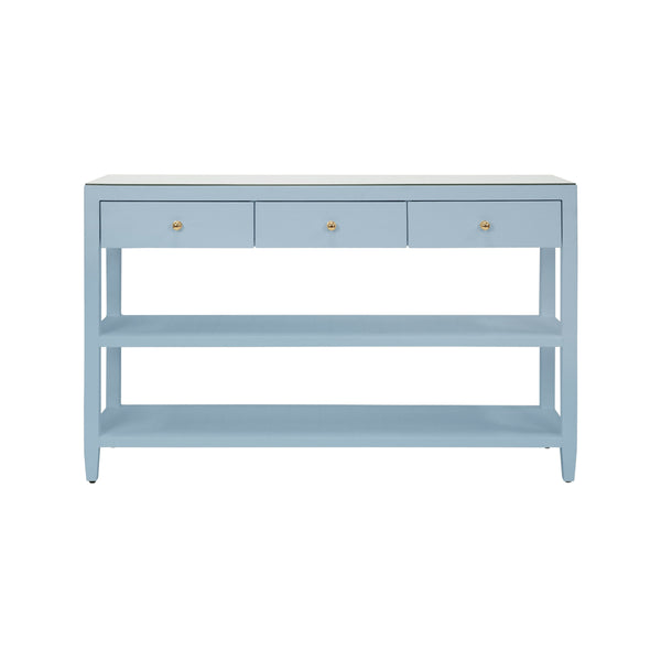 THREE DRAWER CONSOLE WITH TWO OPEN SHELVES IN TEXTURED LIGHT BLUE LINEN WITH POLISHED BRASS KNOBS