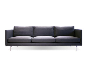 Taut sofa in dark grey tweed with brushed SS legs
