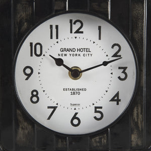 Karl 6.0L x 3.0W x 6.8H Rustic Black Iron Rounded Square Table Clock