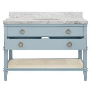 BATH VANITY IN MATTE LIGHT BLUE LACQUER WITH OPEN CANE SHELF, WHITE MARBLE TOP, PORCELAIN SINK, AND ANTIQUE BRASS RING HARDWARE, 48" WIDE