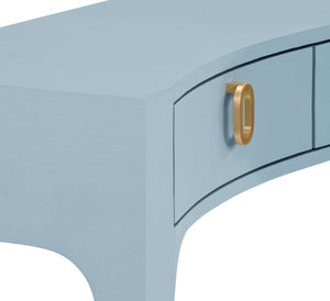 CURVED FRONT CONSOLE WITH THREE DRAWERS IN TEXTURED LIGHT BLUE LINEN WITH SATIN BRASS RING HARDWARE AND GLASS TOP