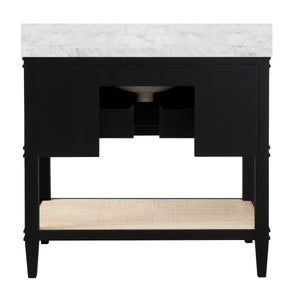 BATH VANITY IN MATTE BLACK LACQUER WITH OPEN CANE SHELF, WHITE MARBLE TOP, PORCELAIN SINK, AND ANTIQUE BRASS RING HARDWARE